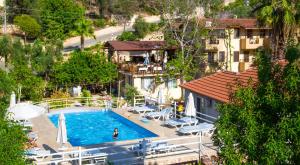 an overhead view of a swimming pool in a resort at Flower Hotel Patara in Patara