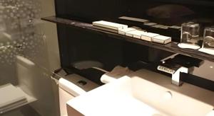 a bathroom with a white sink and a counter at Pengker Deluxe Collection Hotel(Haiancheng Branch) in Shenzhen +30 photos