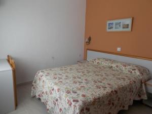 Postel nebo postele na pokoji v ubytování Pensión La Palma