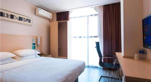 Μια τηλεόραση ή/και κέντρο ψυχαγωγίας στο City Comfort Inn Xianning Xian'an