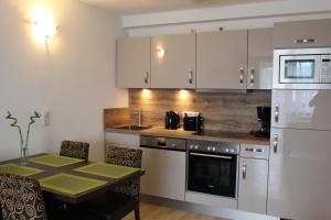 Kuchnia lub aneks kuchenny w obiekcie Apartment Elisa