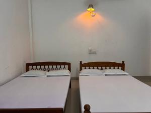 Postel nebo postele na pokoji v ubytování Eastern Holiday Resort and Restaurant