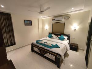 Postel nebo postele na pokoji v ubytování Jazzy Beach Guest Rooms