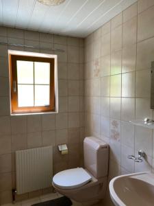 Koupelna v ubytování Haus Heim + 4 fotografie