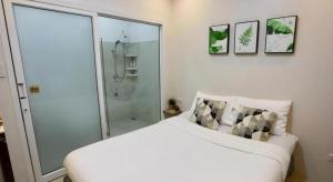Кровать или кровати в номере 20 North Hotel Mae Sai +97 фотографий
