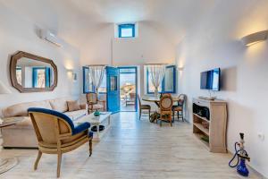 TV a/nebo společenská místnost v ubytování Desiterra Resort & Spa