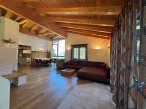 a living room with a couch and a table at Ferienhaus Sellraintal in Gries im Sellrain