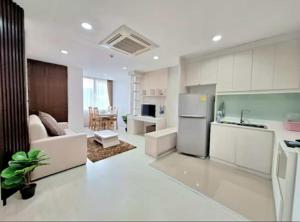 a kitchen and living room with a refrigerator freezer at Nimman Condo,Mountain View in Chiang Mai