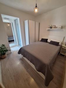 Postel nebo postele na pokoji v ubytování Apartment Mirjana