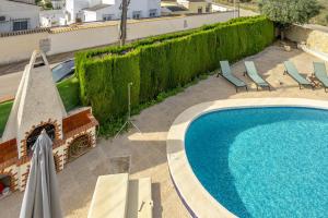 Piscina en o cerca de Una villa de lujo con propio jardín y piscina