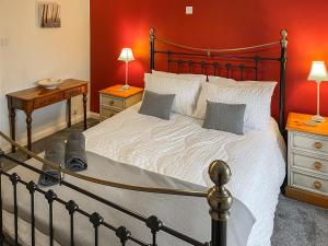 Voodi või voodid majutusasutuse Rowan Cottage toas +6 fotot