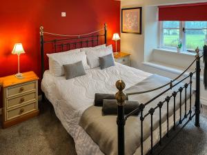 Voodi või voodid majutusasutuse Rowan Cottage toas