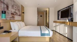 TV a/nebo společenská místnost v ubytování City Comfort Inn Ji'an South Administrative Center + 163 fotografií