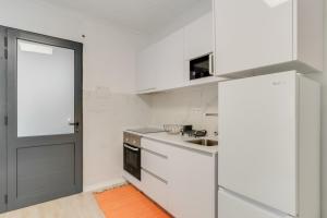 Køkken eller tekøkken på Casa Teixeira by Holiday Rental Madeira + 11 billeder