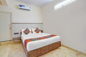 Postel nebo postele na pokoji v ubytování FabHotel Metro Grand - Koramangala + 21 fotografií