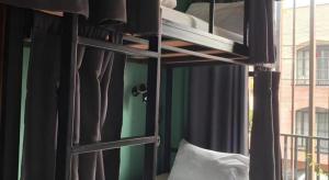 Letto o letti in una camera di Nimman Forest Hostel