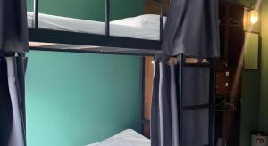 Letto o letti in una camera di Nimman Forest Hostel