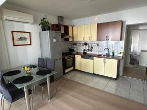 Kuchyň nebo kuchyňský kout v ubytování Apartments Centar - Mirjana