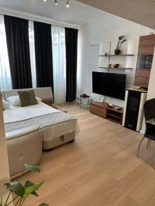 Postel nebo postele na pokoji v ubytování Apartments Centar - Mirjana