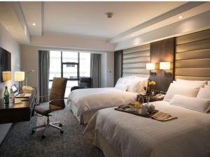 Postel nebo postele na pokoji v ubytování Swissotel Lima