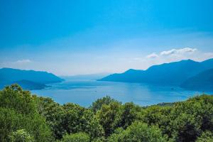 a view of a large body of water with mountains at Casa Cora in Agra