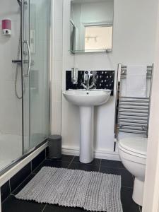 Ένα μπάνιο στο Luxury 2 Bed Gem In Heart Of Belfast