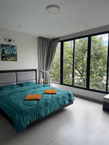 Postel nebo postele na pokoji v ubytování AhuraMazda Hotel