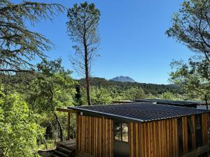 a house with solar panels on top of it at Citykamp d'Aix-en-Provence in Aix-en-Provence