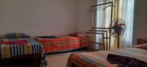 Letto o letti in una camera di Mystique Hideout