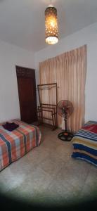 Letto o letti in una camera di Mystique Hideout