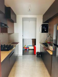 Kuchyň nebo kuchyňský kout v ubytování CDS Luxury Homestay Shimla + 10 fotografií