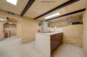 Kuchyň nebo kuchyňský kout v ubytování Casa San Domenico 7 by Vallettastay + 10 fotografií