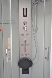 a shower in a bathroom with a glass door at Apartment Eva in Zadar +32 photos