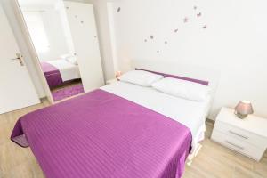 Katil atau katil-katil dalam bilik di Apartments Marija