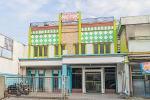 KampungbaruにあるSAHABAT Hotel Tangerang By Reccomaのギャラリーの写真