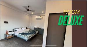 Postel nebo postele na pokoji v ubytování Unity homestay