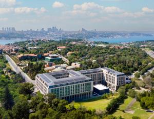 an aerial view of a building with a city in the background at Altunizade Suites Istanbul, Curio Collection By Hilton in Istanbul