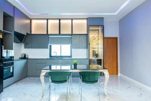 Køkken eller tekøkken på Pool Villa Pattaya Nongprue-3Bedroom