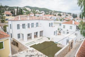an aerial view of a white house at Liberty Suites Spetses in Spetses