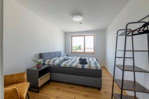 Postel nebo postele na pokoji v ubytování Bodensee Bergblick Suite
