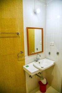 Koupelna v ubytování Hotel Shree Krishna Jungle Resort