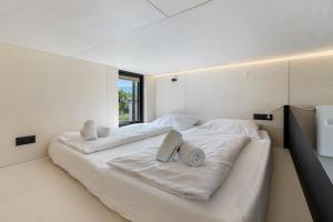 Posteľ alebo postele v izbe v ubytovaní KODA LOFT - Urlaub im Tiny House Bodensee