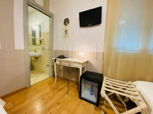 TV a/nebo společenská místnost v ubytování Hotel Volta