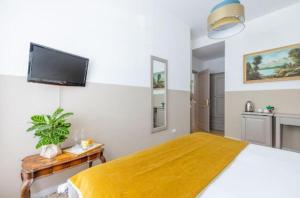Letto o letti in una camera di Next Stop Vatican Guest House