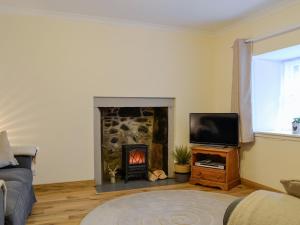 TV a/nebo společenská místnost v ubytování Willesdene Cottage