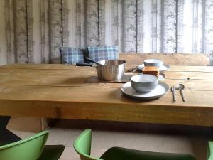 Ruang duduk di Ferry Cottage +15 gambar