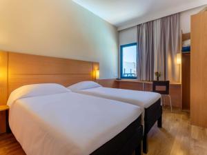 Postel nebo postele na pokoji v ubytování Ibis Meknès