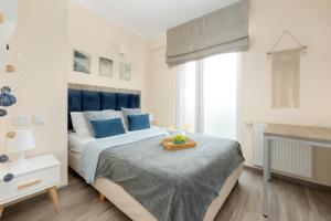 Postel nebo postele na pokoji v ubytování Eleganckie Apartamenty Sun Seasons 24 Blisko Plaży z Parkingiem by Noclegi Renters