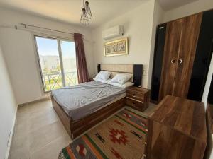 Ένα ή περισσότερα κρεβάτια σε δωμάτιο στο Mountain View,MVRS05,Appartment Pool View1st floor +1 φωτογραφίες