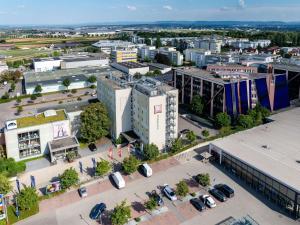 an aerial view of a city with buildings at ibis Stuttgart Airport Messe in Leinfelden-Echterdingen